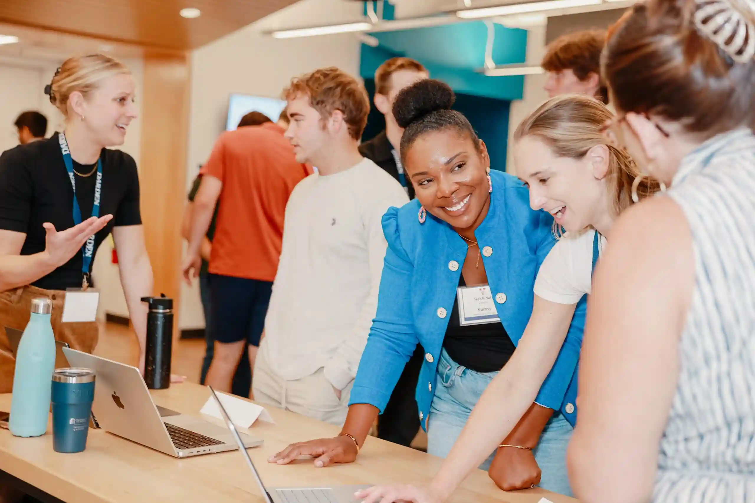 Students collaborating inside Darden’s entrepreneurship lab during a group project