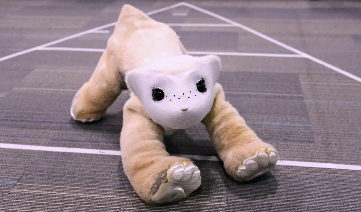 Close-up of the Familiar AI pet robot prototype with soft fur, expressive eyes, and animal-inspired design.