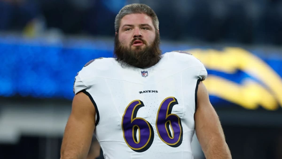 Ben Cleveland standing on the sideline during a Baltimore Ravens game