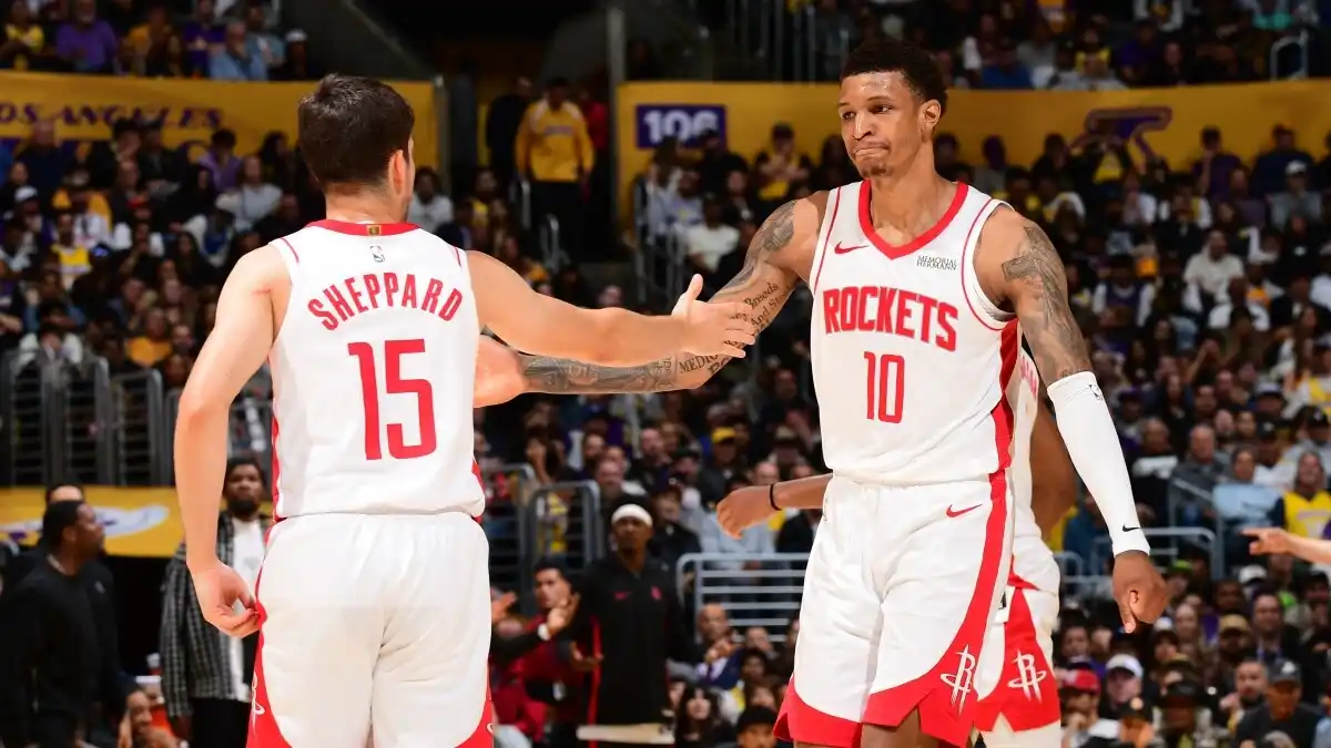 Reed Sheppard celebrates with Rockets teammate vs Lakers in NBA playoffs