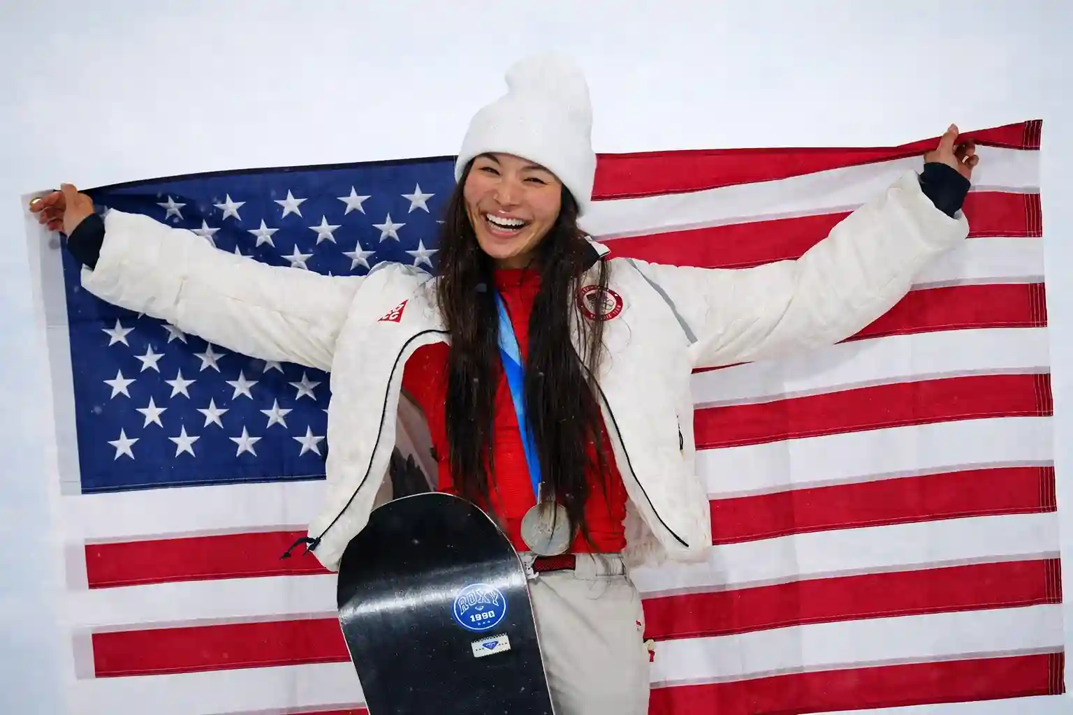 South Korea’s Gaon Choi launches into a high aerial trick during her gold-medal run in the women’s snowboard halfpipe at the 2026 Winter Olympics